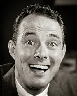 Awed: Happy Laughing Man Funny Facial Expression with