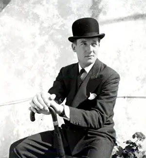Debonair: Hardy Amies in bowler hat