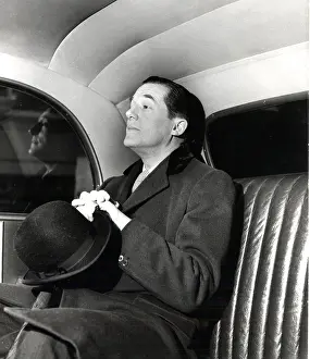 Supercilious: Hardy Amies in the back of a car