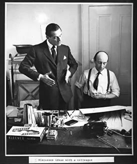 Tissues: Hardy Amies discussing designs with tailor