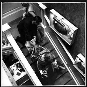Banister: Hardy Amies models on staircase