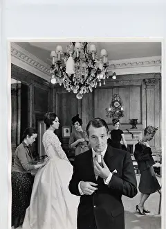 Needlewoman: Hardy Amies in perfume advertisement