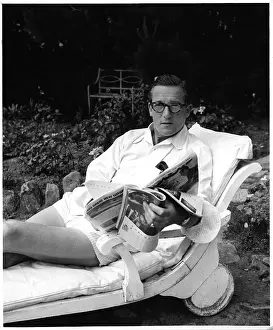 Hardy Amies reading magazine