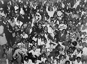 Carnera: Harlem crowd celebrating African American ?