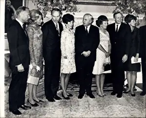 Entertains: Harold Wilson with lunar astronauts and their wives