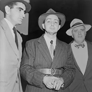 Perp: Harry Gold under arrest for spying in 1950. He