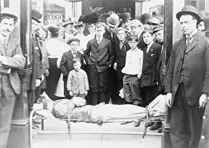 Illusionists: Harry Houdini (1874-1926), strapped to cot, ?