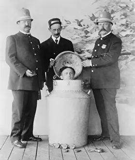 Illusionists: Harry Houdini performs the great milk can ?