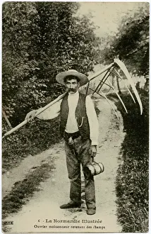 Harvest labourer returning from fields - Normandy, France