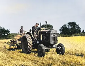 Thecolourisedpic: HARVESTING WITH TRACTOR