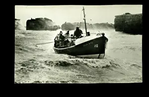 Lifeboat: Hastings lifeboat on a rough sea, with crew on board