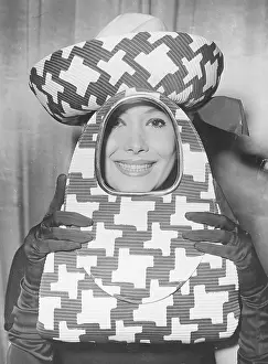 Milliners: Hat and bag > poncho < of Milliners Guild