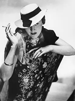 Contrasting: Hat fashion, 1937