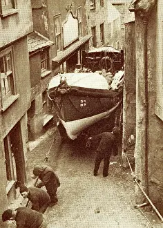 Lifeboat: Hauling the lifeboat through a narrow street