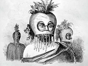 1751: Hawaiian native in ceremonial masks; By John Webber