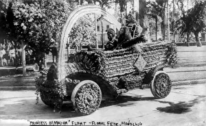Hawaiians: Three Hawaiians in car used as a float in ?