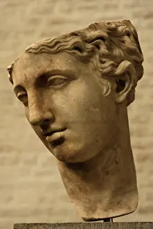 Aphrodite: Detail of a head of the statue of a goddess. Roman copy