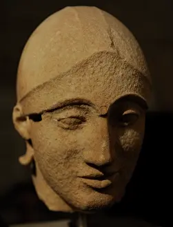 Helper: Head of the trojan helper. East Pediment's Group of the Temp
