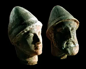 Existed: Two heads of divinities (in fired clay), from