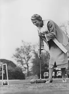 Hoop: Heather Thatcher playing croquet, 1936
