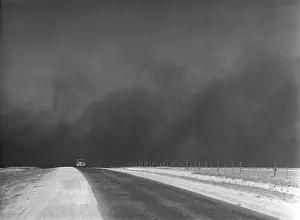 Panhandle: Heavy black clouds of dust rising over the ?