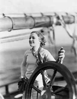 Booms: AT THE HELM