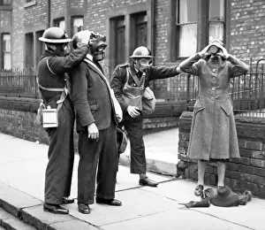 Respirator: Helping to put on gas masks, ARP training exercise