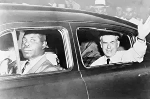 Campaigned: Henry A. Wallace waving from an automobile ?