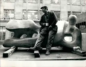 Ernie: Henry Moore sculpture with lorry driver relaxing, London