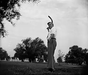 Boomerang: Henry Wallace, Sec. of Agriculture, throwing a