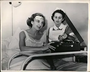 Russe: Herida May, ballerina, listens to gramophone record