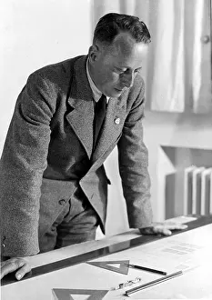 Giesler: Hermann Giesler, architect, at the drawing board