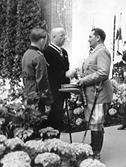 Armaments: Hermann Goring with armaments workers, 1942