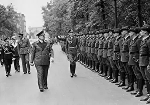 Reason: Hermann Goring steps off the front of forest officials, 1939