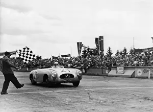 Tracksuit: Hermann Lang wins at Nurburgring
