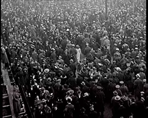 Angled: High Angled Shot of a Crowd Gathering in a Street