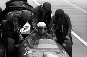 Brdc: Hill's Ferrari in pits, Silverstone, England