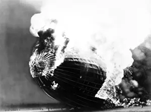 Dwarfed: The Hindenburg disaster. People run away ?