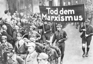 Slogan: Hitler during a deployment of the SA, 1926