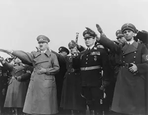 Annexing: Hitler, with Goering and Goebbels, saluting upon