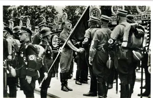 Involve: Hitler shaking hands during a Party Day ceremony