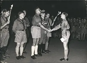 Accolade: Hitler Youth ceremony at night