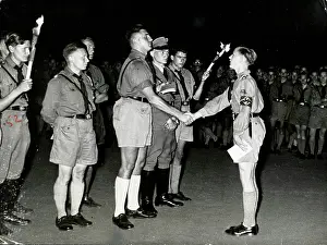Accolade: Hitler Youth ceremony at night
