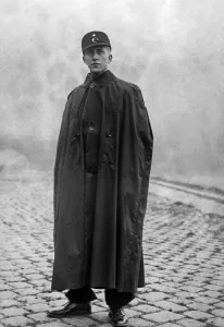 Raincoat: HJ member in raincoat, 1938