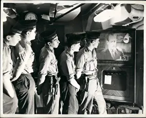 Tuned: HMS Ark Royal crew watching television
