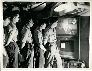 Tuned: HMS Ark Royal crew watching television