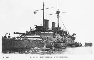 Camperdown: HMS Camperdown with three submarines moored alongside
