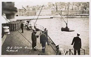 Hoists: HMS Marlborough - 13.5 inch shell being hoisted aboard