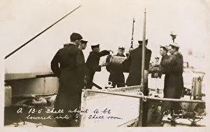 Lowers: HMS Marlborough - Lowering a 13.5 inch shell into shell room