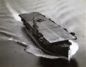 Avenger: HMS Ravager, escort carrier, with aircaft on deck